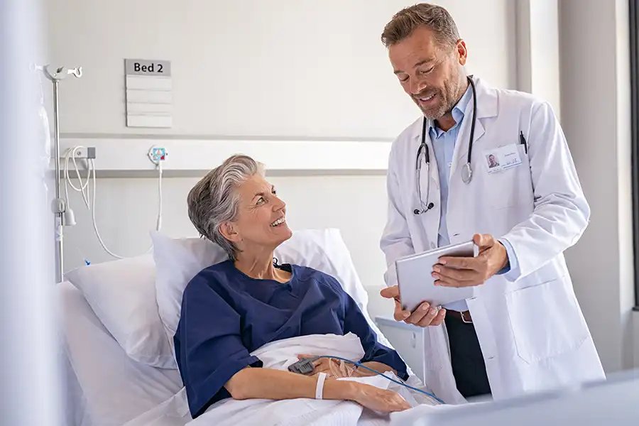 Elderly couple reviewing documents